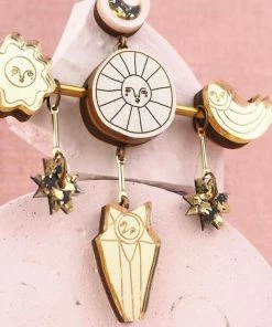 Lucinda's New Gold Space Oddity Earrings